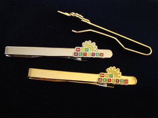 затискачі краваток  з логотипом "світ дитинства"