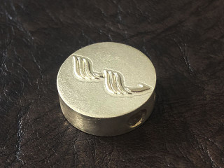 пломба з логотипом "W" на гумку для щоденника