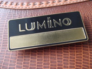 badges with a window for the name "lumiino"