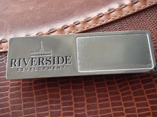 metal badges with riverside logo