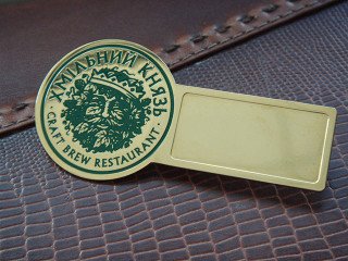 Branded badges with the logo "Khmelnoy knyaz"