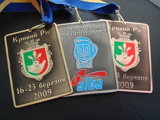 спортивні медалі на стрічці "ФБУ"