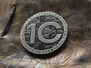 corporate - commemorative coin of 10 years