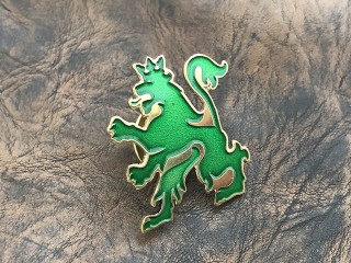 Metal pins with the symbolism of the city "lion"